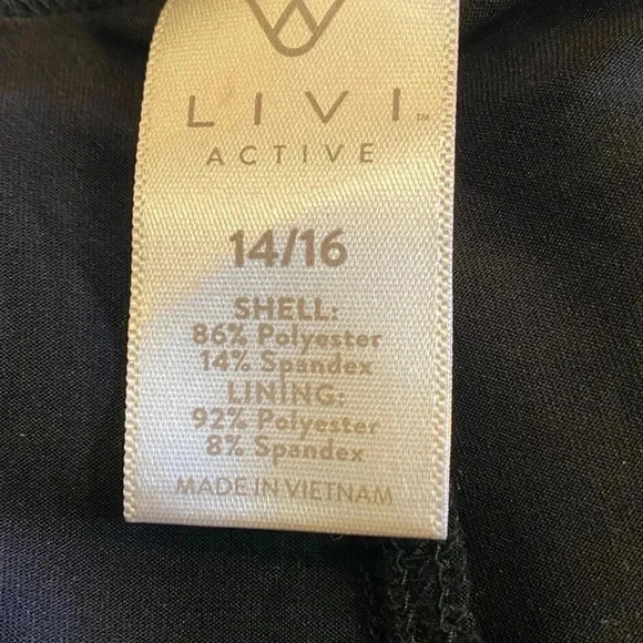 LIVI Active skirt with built in short. Adorable pleated detail in back 14/16 - Picture 3 of 6